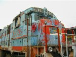 FXE C30-7 Locomotive in the yard with faded paint scheme